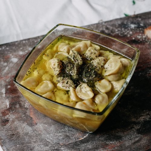 meat-dushpere-famous-eastern-minced-meat-inside-meal-with-bouillon-brown-desk